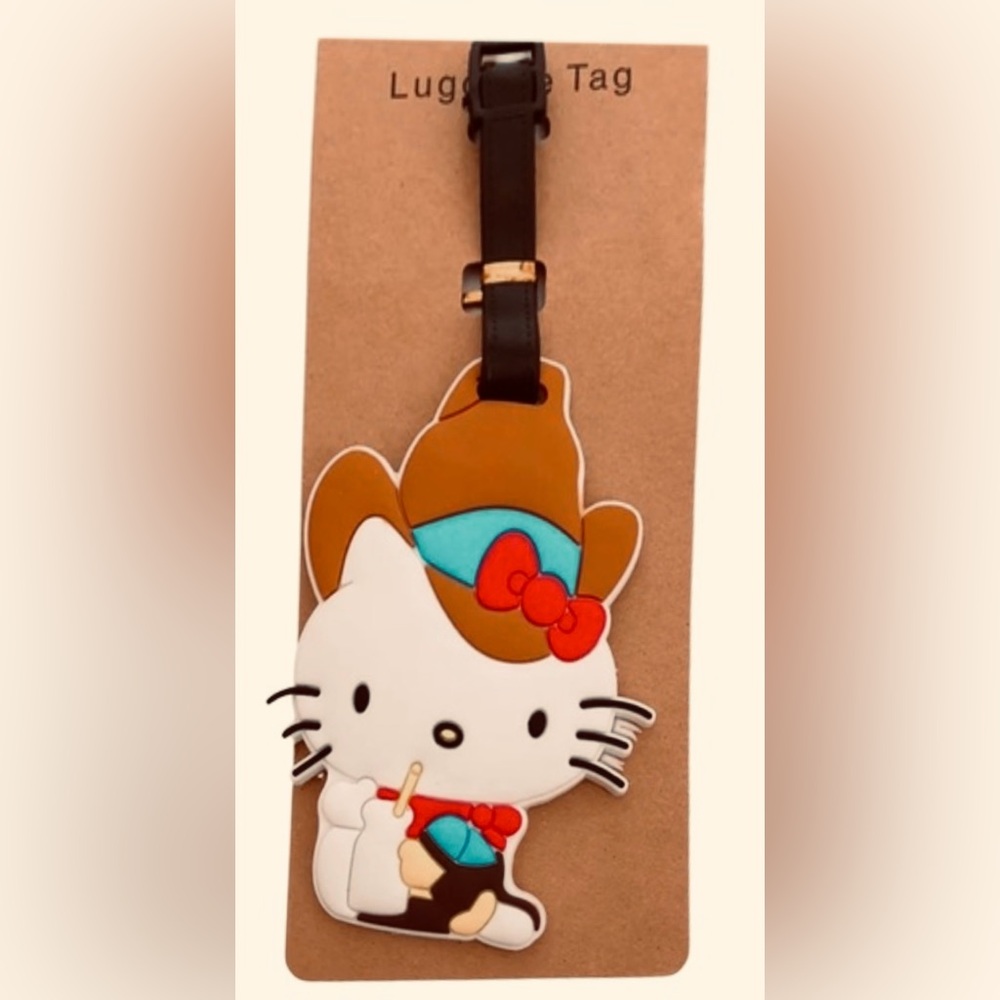 Hello Kitty Brown and Red Bag Charm or Luggage Tag….                        Pink